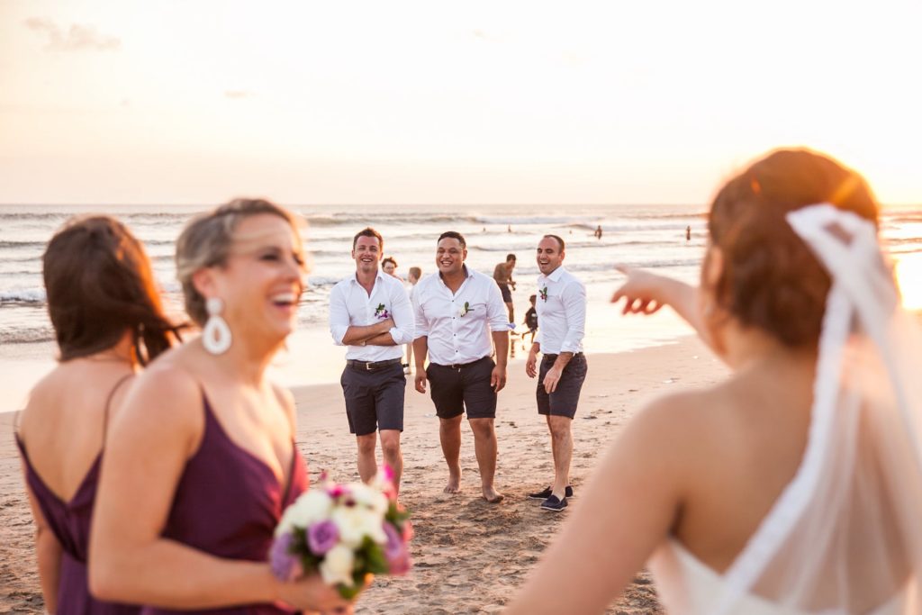 Bali Beachfront Wedding - Bride and Groom beach party photo shoot